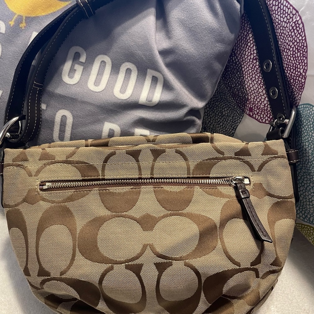 Coach shoulder bag. Brown and tan. Great condition.